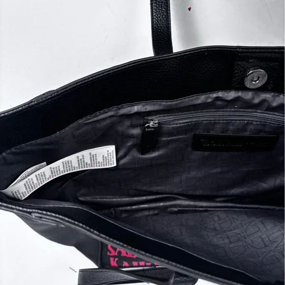 Danielle Nicole Disney It’s a Small World Black Tote with Colorful Patches - Picture 10 of 11